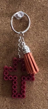 Handcrafted Cross Shaped Keychain With Tassel