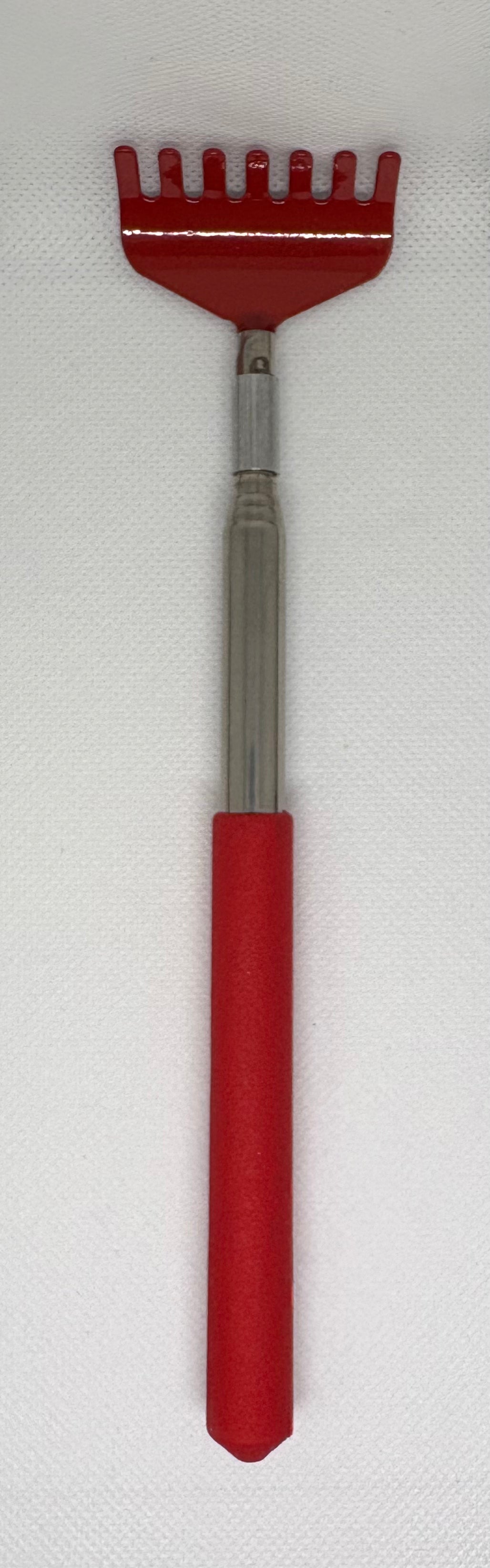 “Scratch my Back” Back Scratcher extends 26 inches