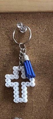 Handcrafted Cross Shaped Keychain With Tassel