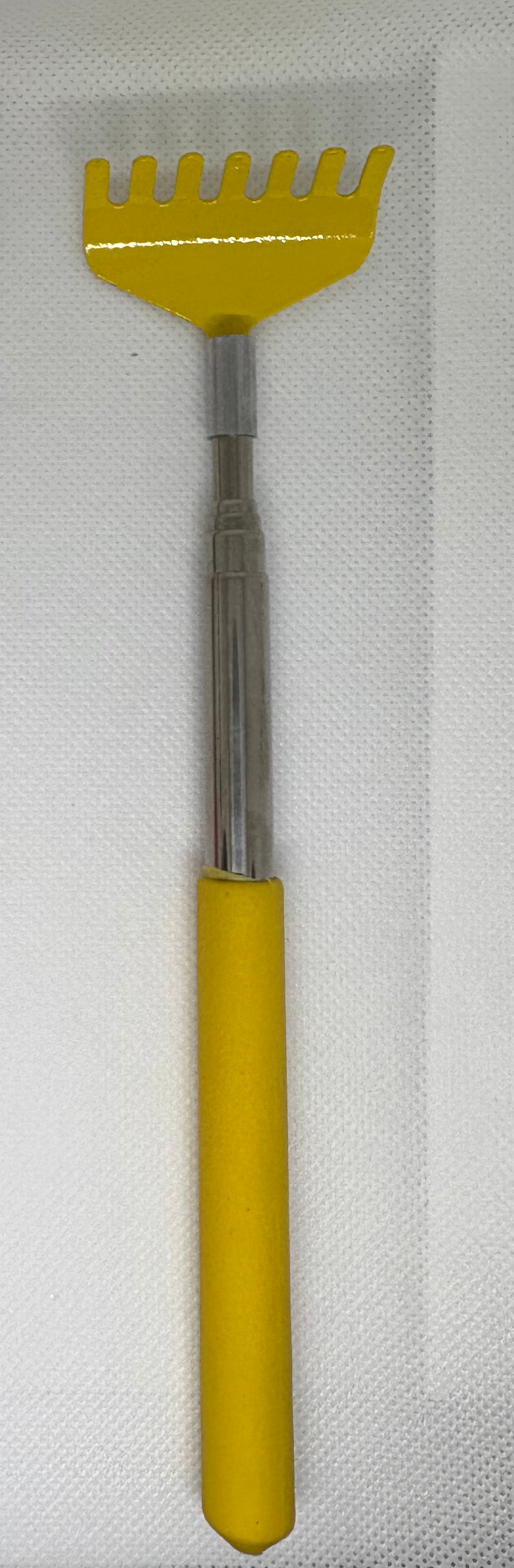 “Scratch my Back” Back Scratcher extends 26 inches