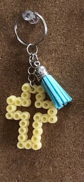 Handcrafted Cross Shaped Keychain With Tassel